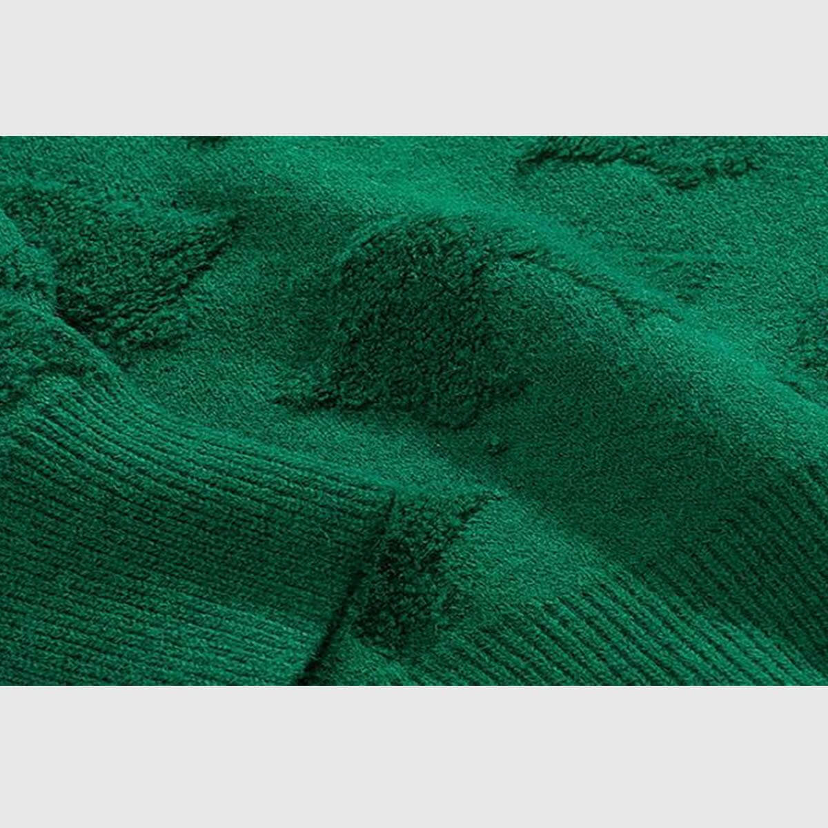 Suéter de punto con lazo navideño