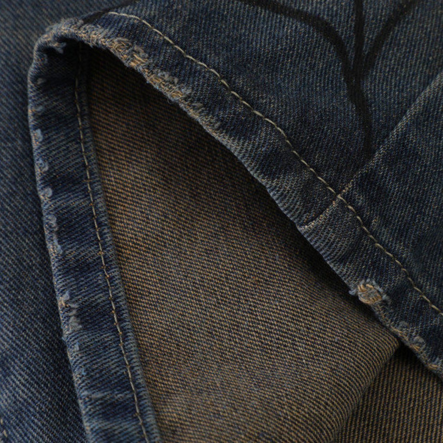 Pantaloncini in denim lavato con stampa di ragno