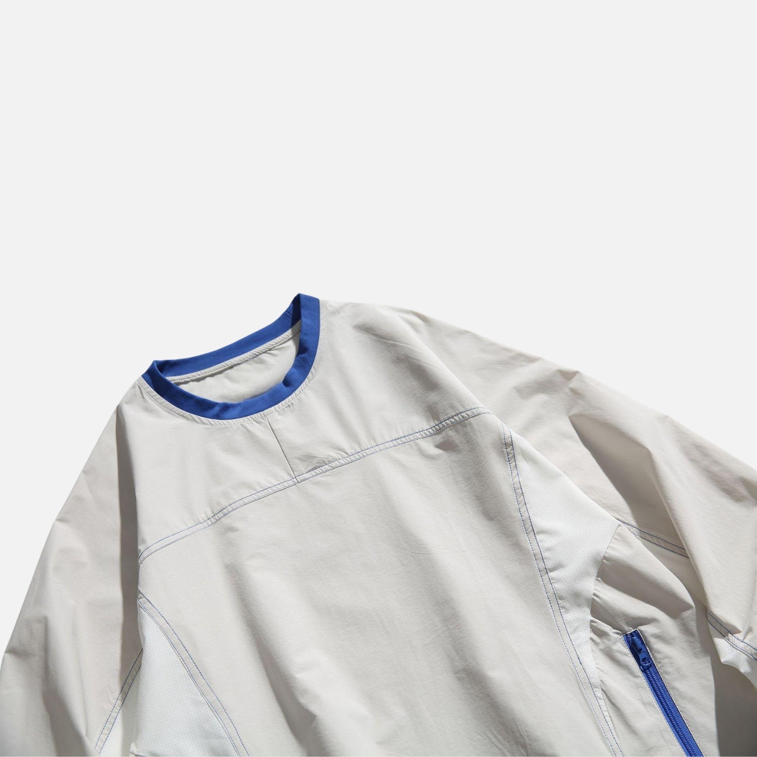 Sweatshirt mit Patchwork-Reißverschluss und Tasche