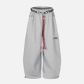 Pantalones holgados con cinturón tejido