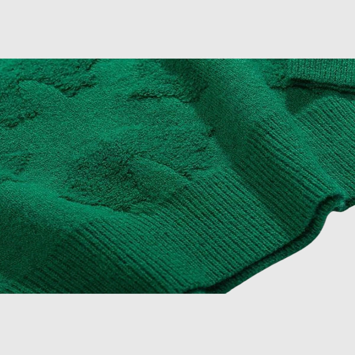 Suéter de punto con lazo navideño