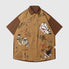 Front view of the brown unisex embroidered cat short sleeve shirt in brown
