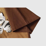 Detail view -4 of the brown unisex embroidered cat short sleeve shirt in brown