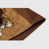 Detail view -5 of the brown unisex embroidered cat short sleeve shirt in brown