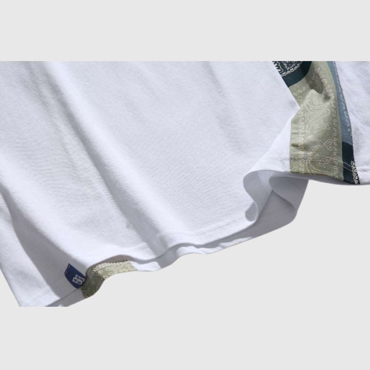 Close-up of the sleeve detail -view-6 on unisex's retro patchwork kimono style shirt