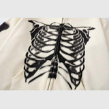 Close-up of skeleton print on white hoodie-2
