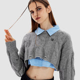 Suéter recortado rasgado tejido con cable