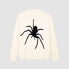 Elegante suéter de patrón de araña