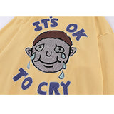 Es ist in Ordnung, Cartoon besticktes Sweatshirt zu weinen