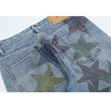 Jeans colorati con motivo pentagramma