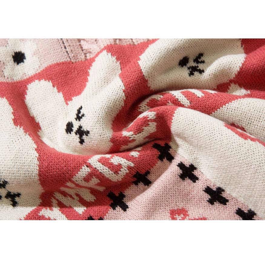 Suéter de patrón de conejo y caqui