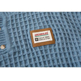 Label Textured Turtleneck Sweater