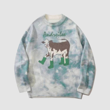 Botas y suéter de punto con patrón de vaca